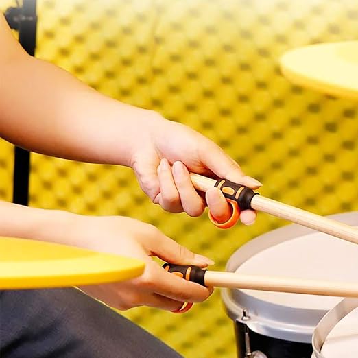 Silicone drumstick rotation controller auxiliary